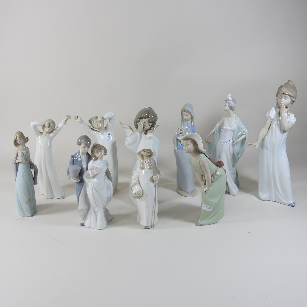 A collection of Lladro and Nao porcelain figures,