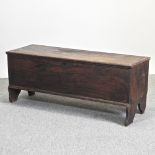 An 18th century and later elm six plank coffer,