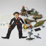 A collection of vintage and tinplate toys
