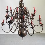 A Dutch brass twelve branch chandelier,
