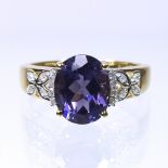 A 9 carat gold purple quartz and diamond ring, boxed,