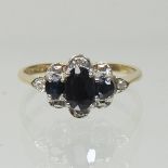 A 9 carat gold sapphire and diamond ring, boxed,