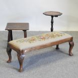 An early 20th century walnut tapestry footstool, 92cm,