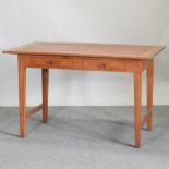 A teak side table, containing two drawers,