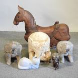A pair of painted wooden models of elephants, together with a rocking horse and various others,