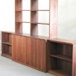 A Team 7 Austrian black walnut sectional bookcase, in three parts, 322cm overall,