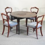 A set of four Victorian mahogany balloon back dining chairs,