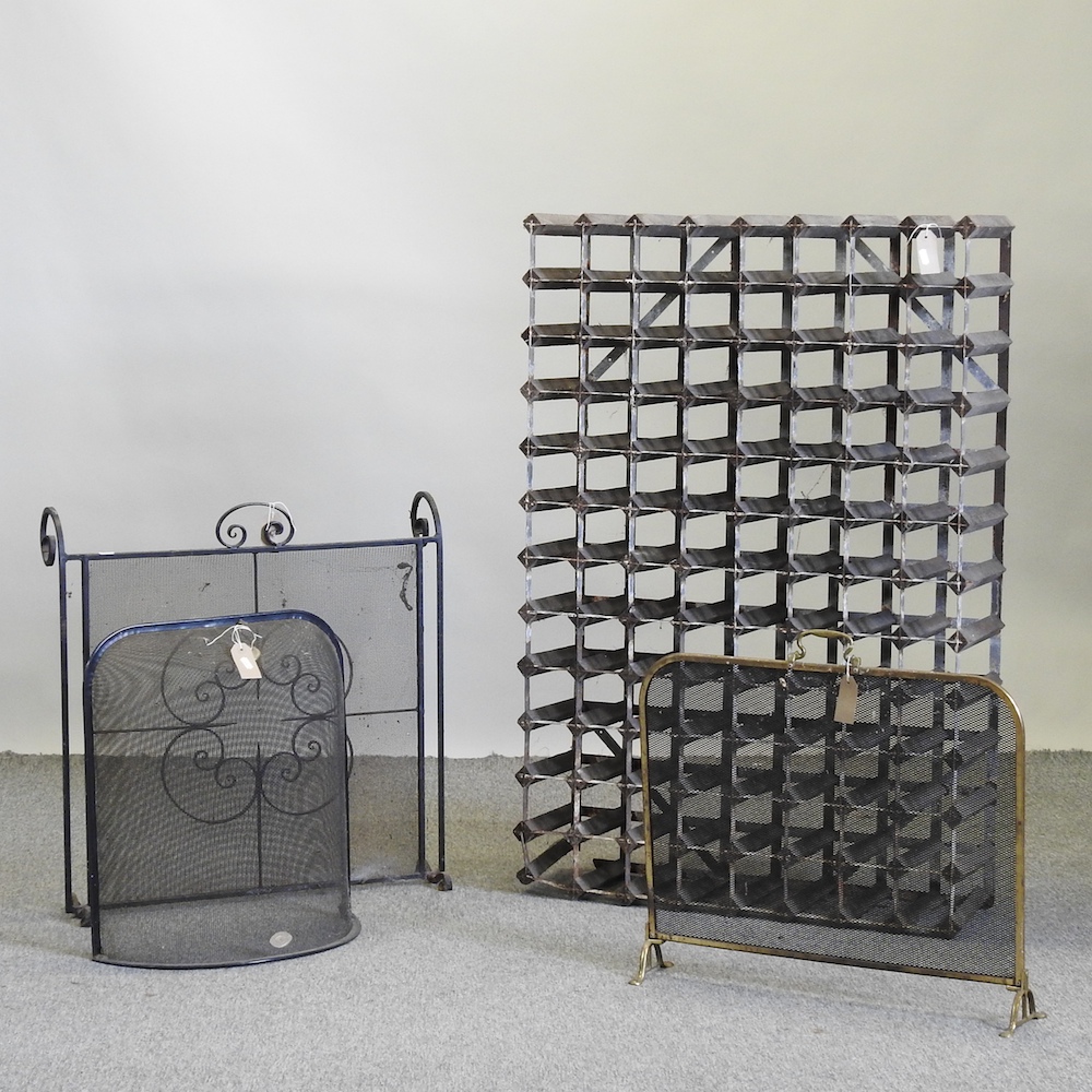 A wine rack, 80cm, together with a fire screen,