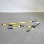 A telescopic pruner, together with telescopic ratchet loppers,