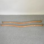 A pair of 19th century French pine serpentine curtain pelmets,