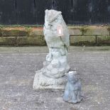 A reconstituted stone garden model of an owl,