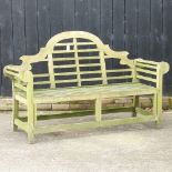 A Lutyens style teak garden bench,