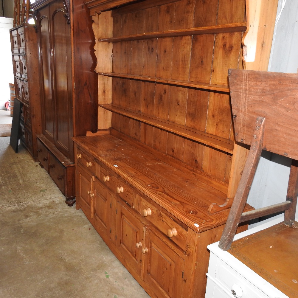 A pine dresser, the plate rack above drawers and cupboards, - Image 3 of 6