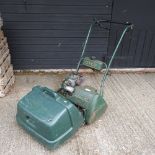 An Atco Commodore B17 petrol cylinder lawnmower,