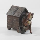 A Viennese style bronze model of a dog and kennel,