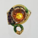 An unusual unmarked citrine and multi gem set ring,