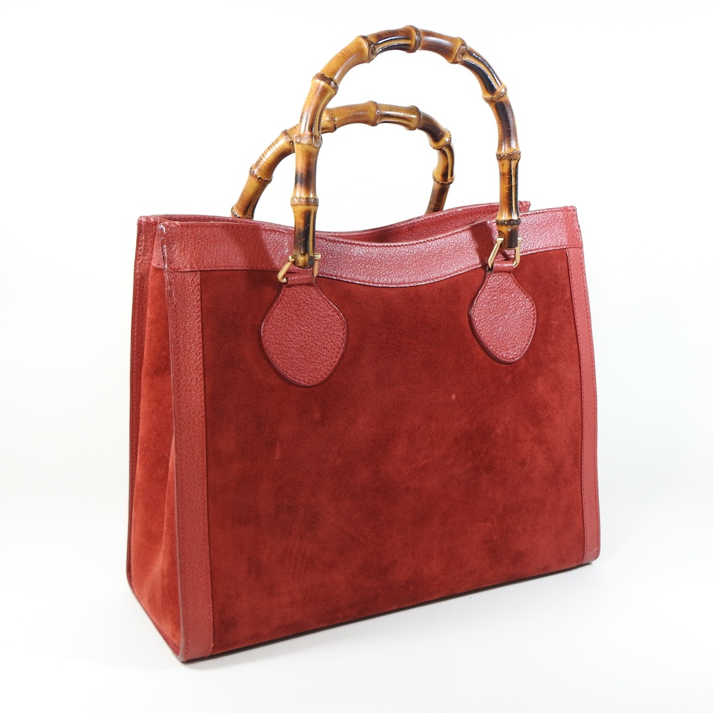 A Gucci red leather and suede 'Diana' satchel bag, with bamboo handles,