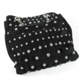 A Donna Karan black suede and metal studded tote bag,