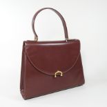 A Must de Cartier brown leather handbag,