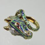 An 18 carat gold, diamond and enamelled ring, in the form of the head of a zebra,