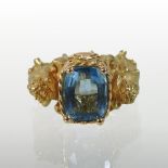 An Italian 18 carat two colour gold blue topaz dress ring,