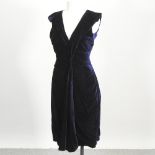 A Prada dark blue velvet cocktail dress, together with a black and purple Vionnet dress,