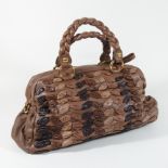 A Miu Miu brown leather handbag, with plaited handles,