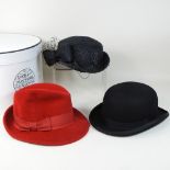 A Sylvia Fletcher at James Lock & co ladies black straw brimmed hat, tied with a straw bow,