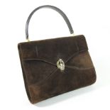 A Gucci brown suede handbag, with a coloured gilt clasp, stamped BO74,