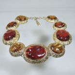 An Yves St Laurent large gilt and glass necklace,