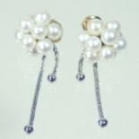 A pair of Boucheron 18 carat gold and pearl cluster earrings, each suspended with a pair of chains,