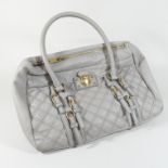 A Marc Jacobs quilted grey leather handbag,