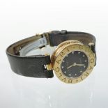 A Bulgari 18 carat gold cased B zero ladies dress watch, having a signed black dial,