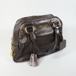 A Prada metallic brown leather designer handbag,