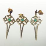 A Theo Fennel 18 carat gold and emerald pendant, in the form of a cross, 4cm high,