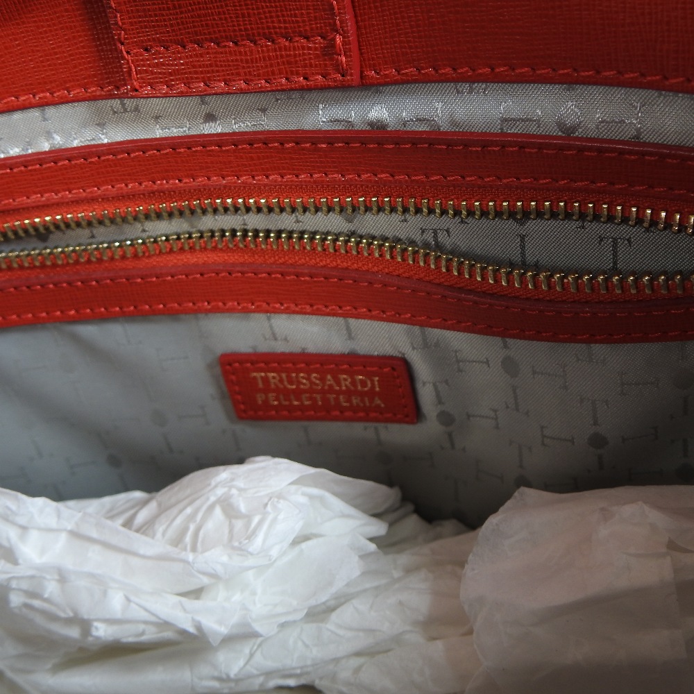 A Trussardi red leather handbag, decorated with buckles, - Image 4 of 6