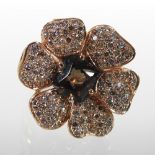 A large 18 carat rose gold, smoky quartz and diamond ring, of flower head design, 2.