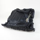 A Donna Karan black leather large tote bag,