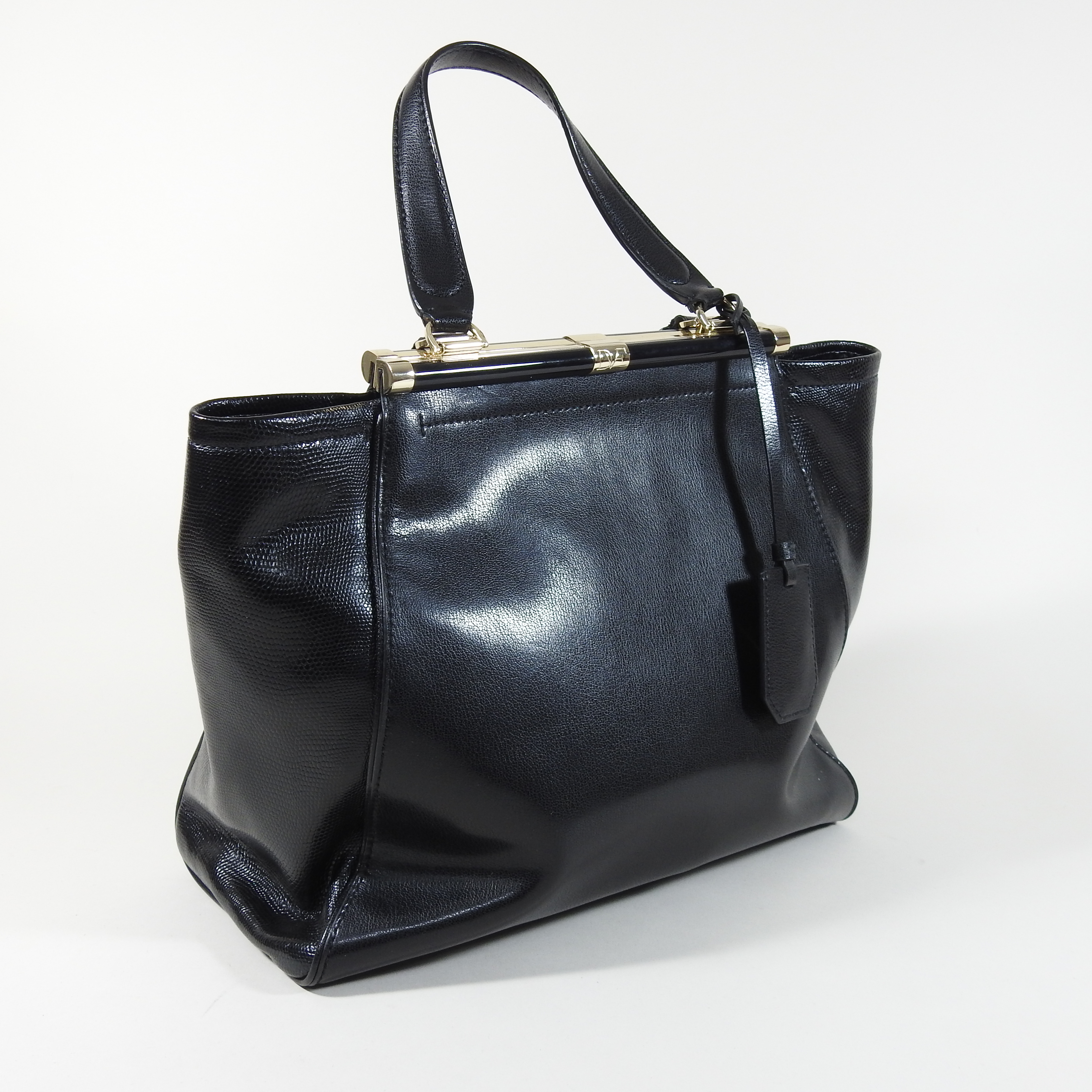 A Diane Von Furstenberg black leather handbag,