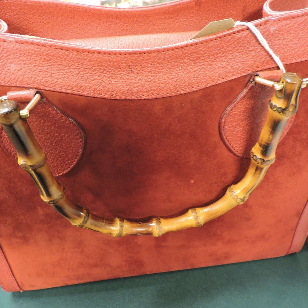 A Gucci red leather and suede 'Diana' satchel bag, with bamboo handles, - Image 26 of 27
