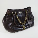 A Prada brown leather designer handbag, with a gilt chain link handle,