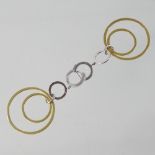 A pair of 18 carat two colour gold multi hoop pendant earrings, marked ASP, 6cm drop,