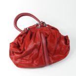 A Zac Posen red leather and fur effect handbag