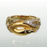 A Magerit 18 carat two colour gold, diamond set and enamelled ring,