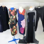 A Sportmax black and floral dress, a Sportmax blue and red dress, a Devore blue dress,