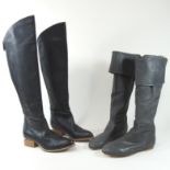 A pair of Alexander Wong thigh high black leather boots, size 37.