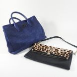 A Diane Von Furstenberg blue suede crocodile effect handbag,