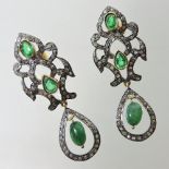 A pair of unmarked emerald and diamond pendant earrings, each collet set,