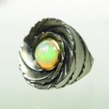 A Sirin Jewellery Atelier 'Fury' silver, 18 carat gold and opal ring, in the form of a flower, 3cm,