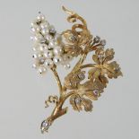 An 18 carat textured gold, diamond and pearl articulated brooch, in the form of a grape vine,